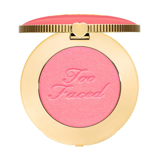 Too Faced Cloud Crush Blush in Golden Hour shade in gold compact.
