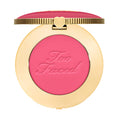 Too Faced Cloud Crush Blush in Watermelon Rain shade in gold compact.