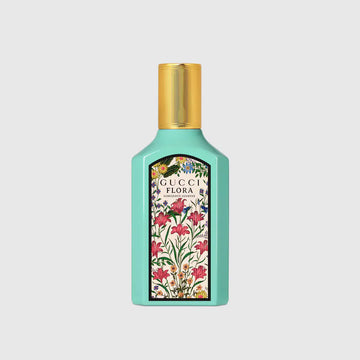 Gucci Flora Gorgeous Jasmine luxury women's perfume featuring jasmine-inspired floral design and turquoise glass bottle.