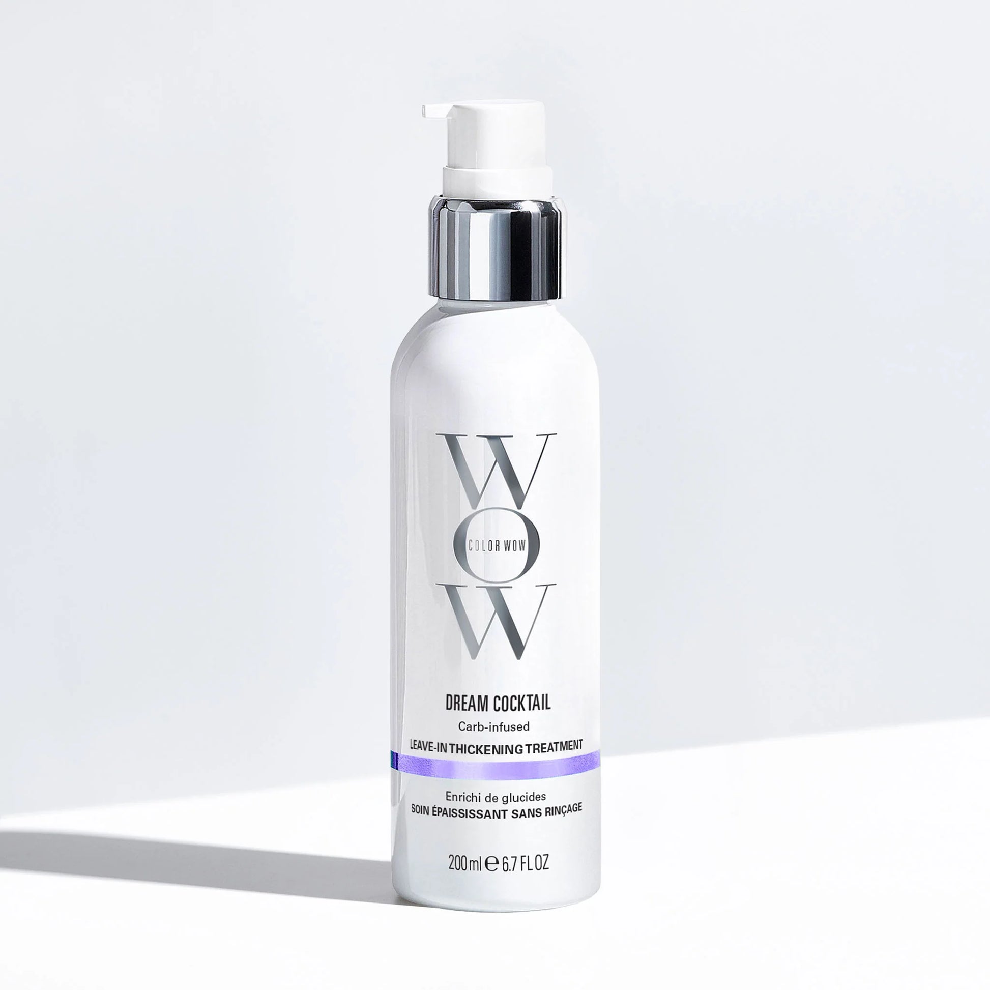 Color Wow Dream Cocktail Carb-Infused Leave-In Treatment bottle with before and after showing fine flat hair transformed into thick voluminous hair after blow-dry styling effect