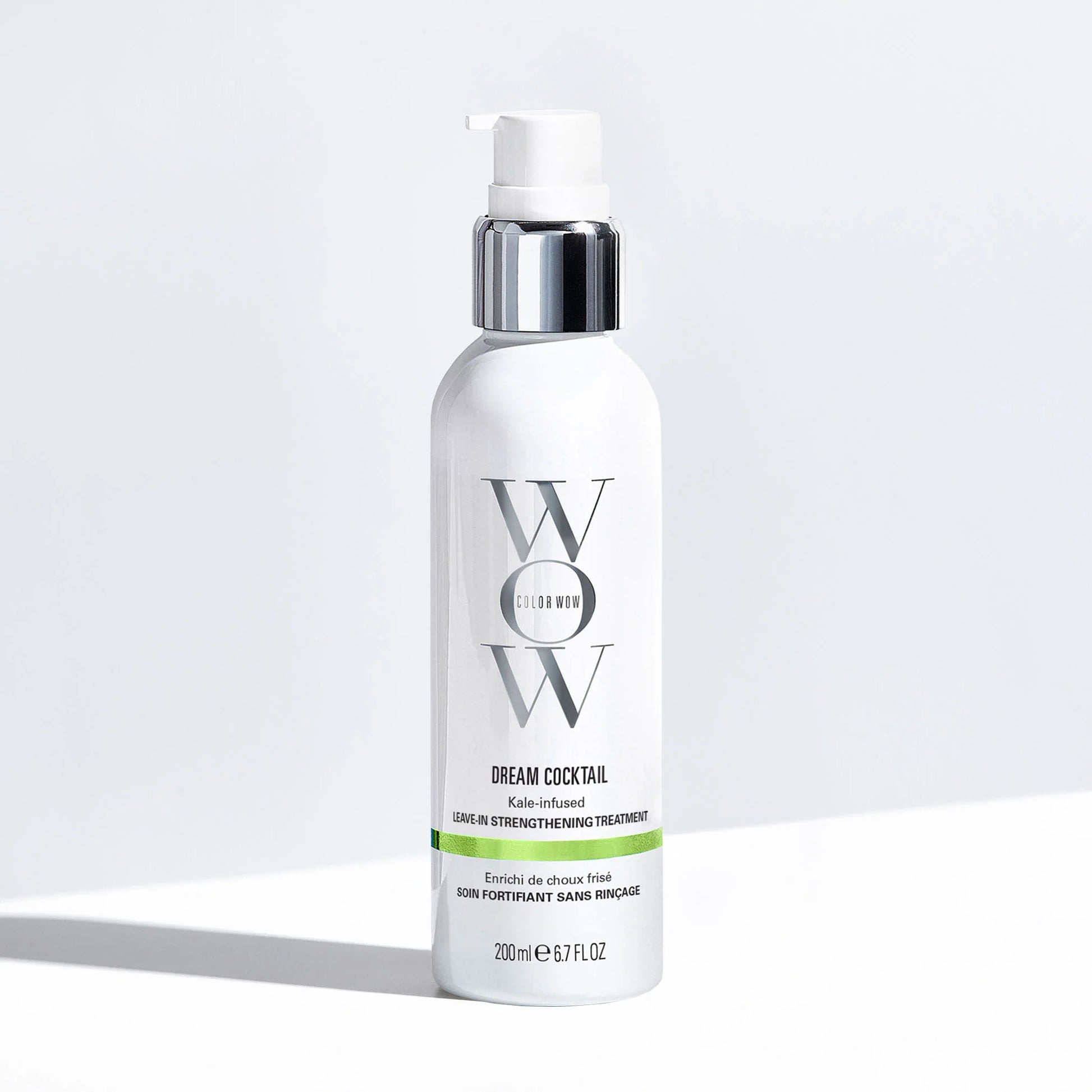 Color Wow Dream Cocktail Kale-Infused Leave-In Treatment bottle shown with before and after hair transformation from damaged brittle hair to smooth strong healthy hair after blow-dry use