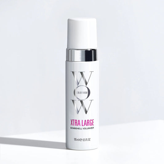 Color Wow Xtra Large Bombshell Volumizer bottle displayed on clean white background with before-and-after hair volume transformation showing fuller, bouncy salon-style blowout results