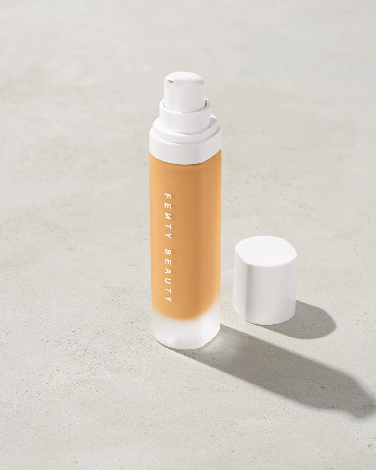 Fenty Beauty Pro Filt’r Soft Matte Longwear Foundation shade 250 bottle on neutral background.