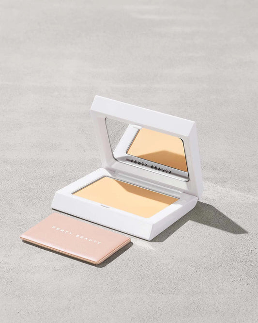 Fenty Beauty Bright Fix Powder in Banana compact.
