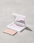 Fenty Beauty Bright Fix Powder in Lavender compact.