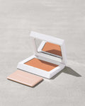 Fenty Beauty Bright Fix Powder in Peach compact.