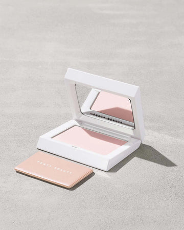Fenty Beauty Bright Fix Powder in Rose Quartz compact.