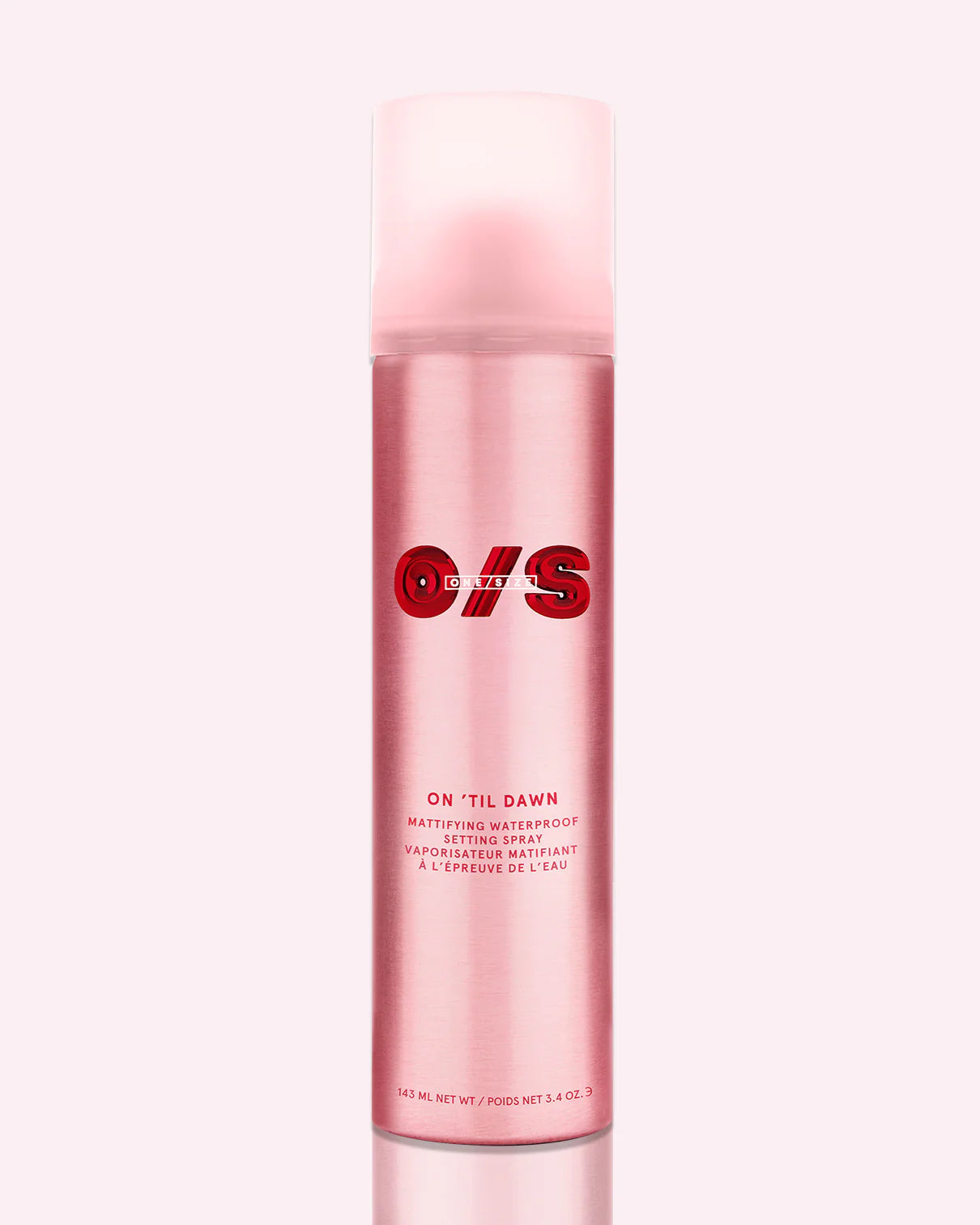 ONE/SIZE On ‘Til Dawn pink matte setting spray bottle with bold red branding, shown on glossy red background representing waterproof long-wear makeup lock and oil-control finish