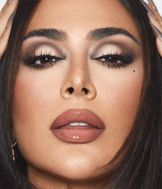 Huda Beauty Creamy Obsessions Brown palette eyeshadow makeup look modeled close-up on Huda Kattan at ZARÉ Cosmetics