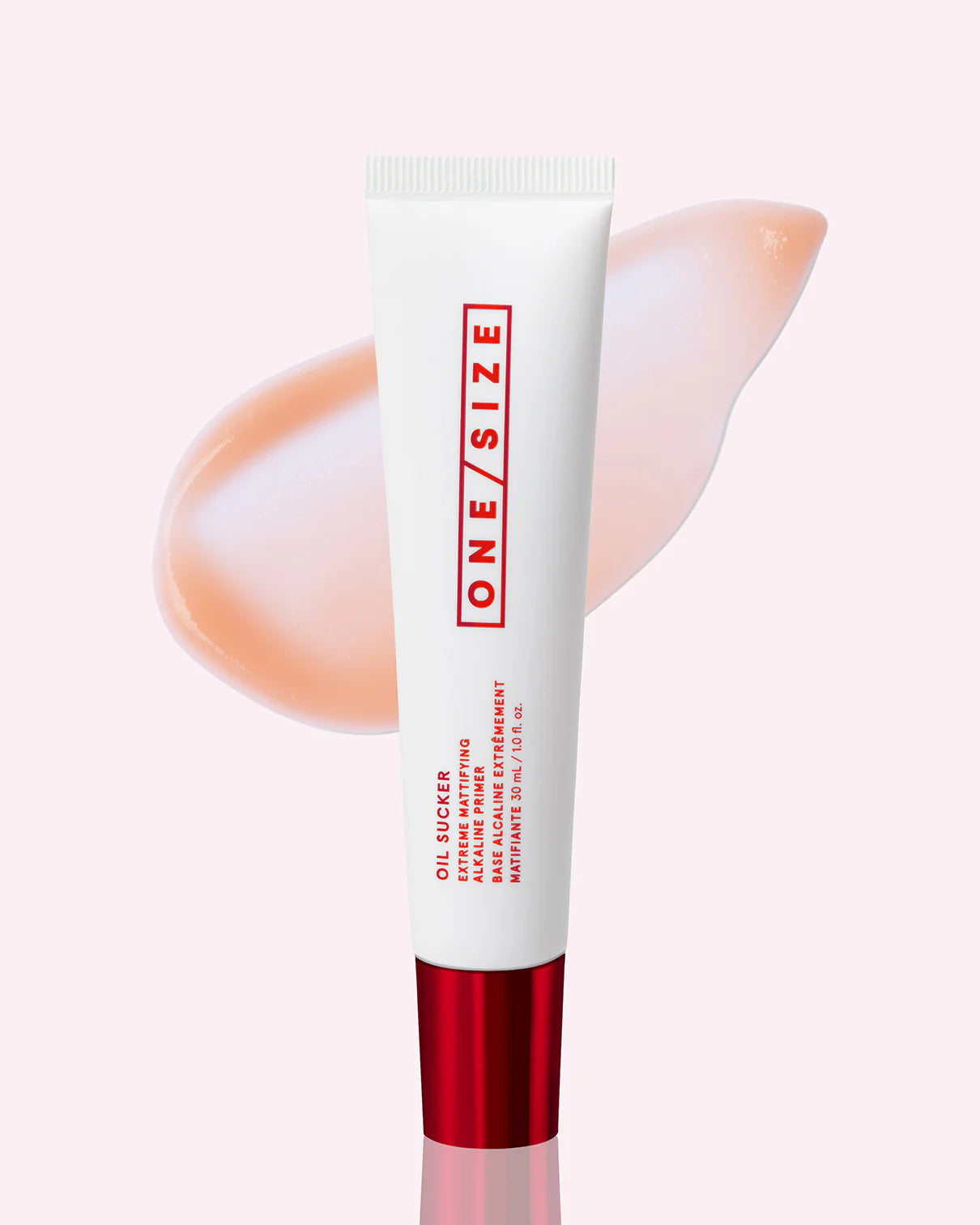 ONE/SIZE Oil Sucker Extreme Mattifying Alkaline Primer tube with red cap and oil-control swatch background, showcasing extreme matte pore-tightening skincare primer for oily ski