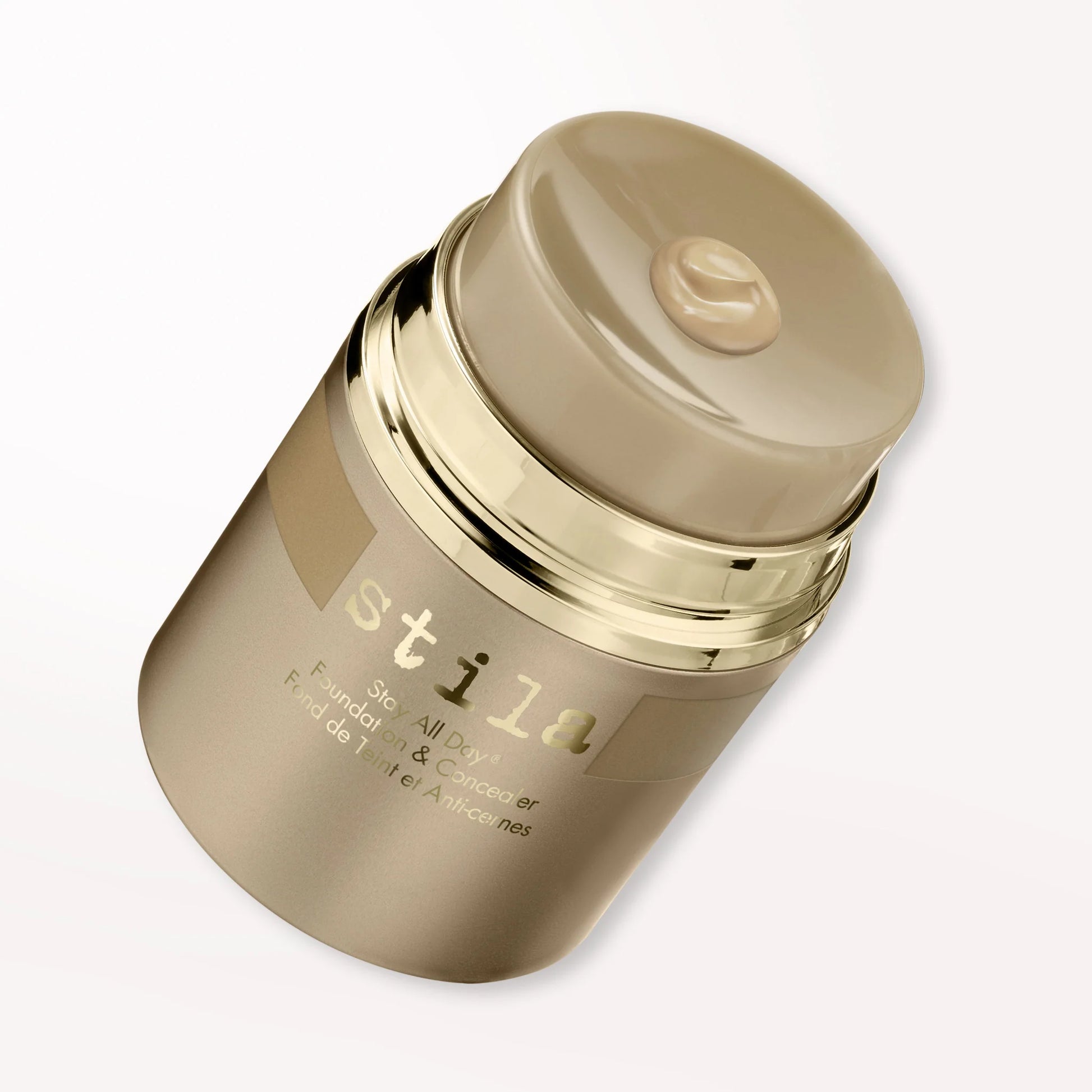 Stila Stay All Day liquid foundation pump bottle with product drop on top isolated on white background at ZARÉ Cosmetics