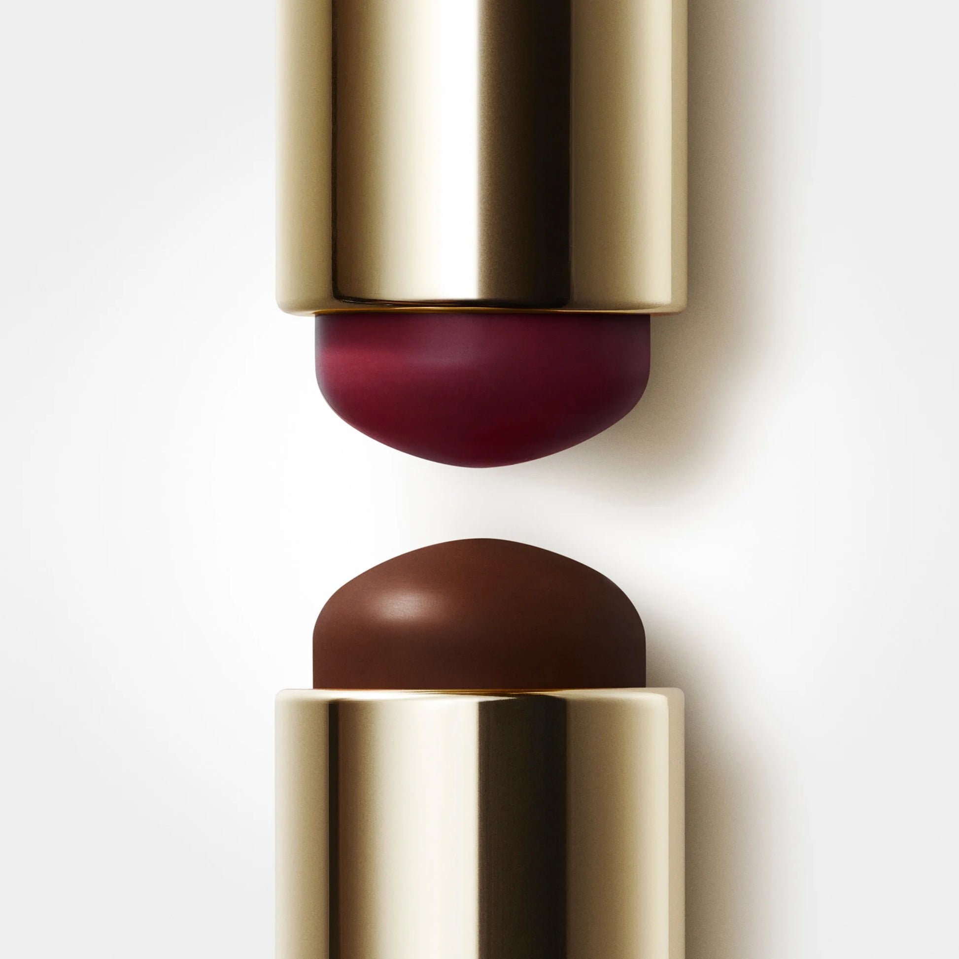 Stila dual-ended makeup stick tips showing plum blush and deep contour cream shades closely at ZARÉ Cosmetics