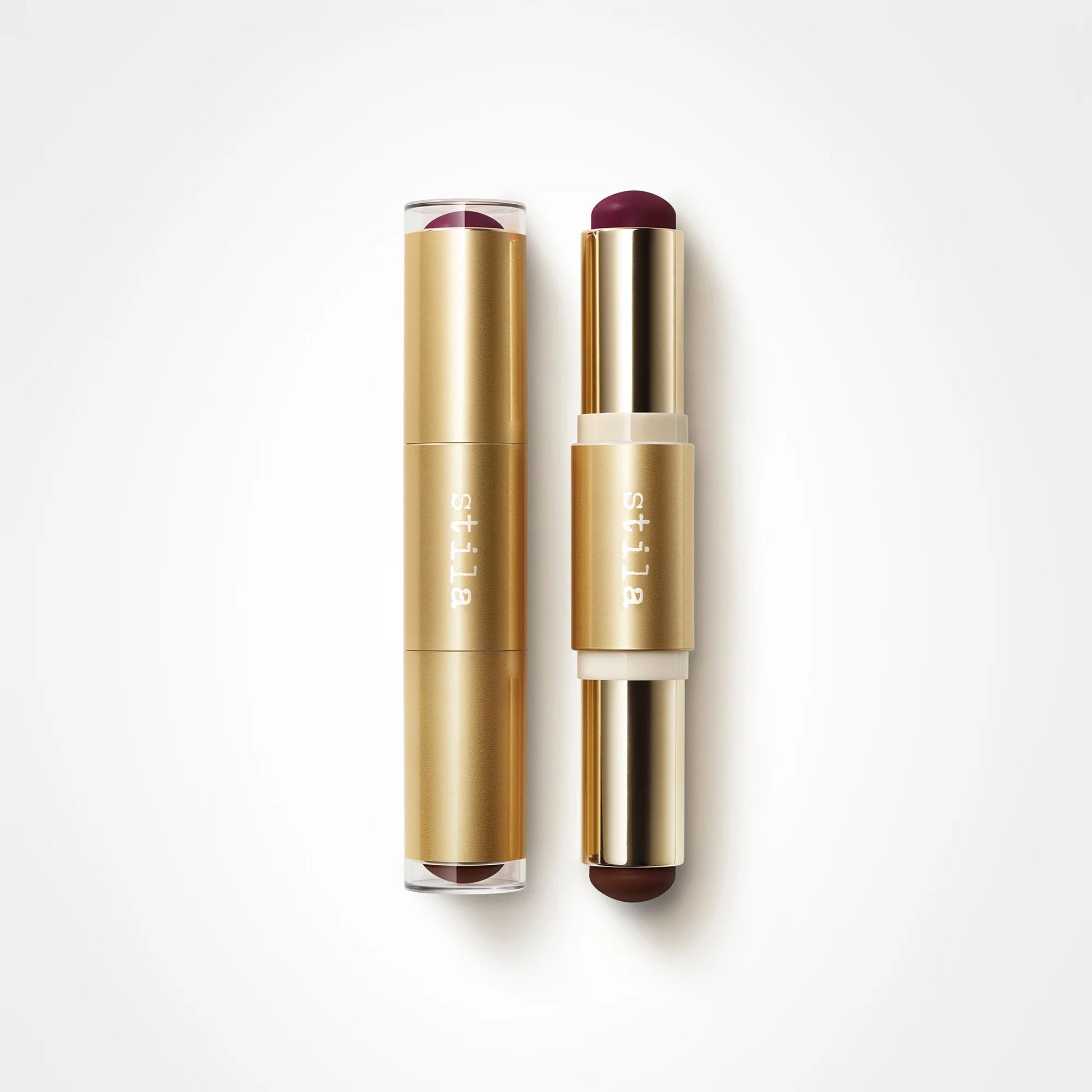 Stila dual-ended contour and blush stick in a gold luxury casing isolated on a white background at ZARÉ Cosmetics