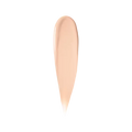 Liquid foundation swatch in shade Warm Porcelain with a smooth texture isolated on a white background for ZARÉ Cosmetics