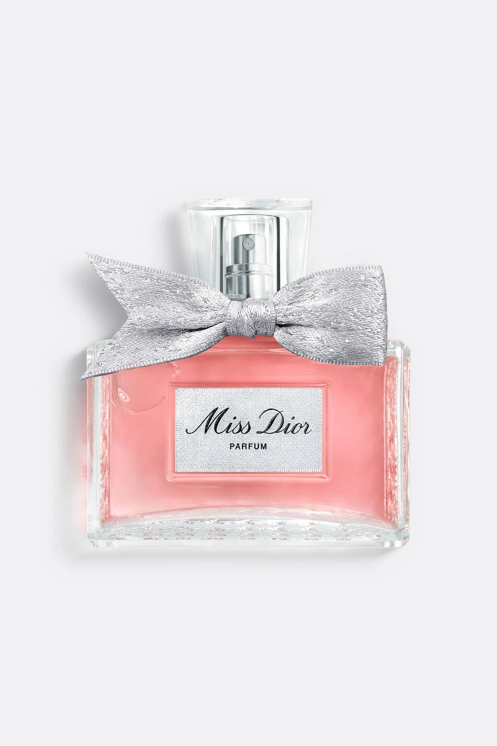 Miss Dior Parfum by Dior luxury women's fragrance bottle with pink perfume and signature silver bow on a soft grey background.