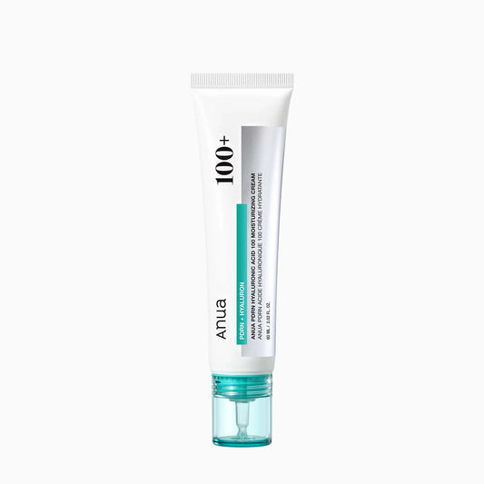 Model applying Anua 100+ moisturizing cream demonstrating dewy, hydrated glass skin finish with skincare hydration glow effect.