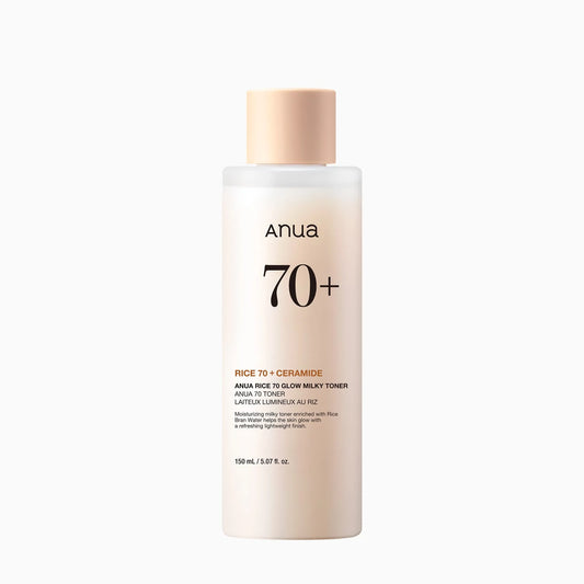 Anua Rice 70 Ceramide Glow Milky Toner bottle in soft beige packaging with “70+” label, shown in a clean skincare product display highlighting hydrating milky texture and minimalist glass-skin aesthetic.