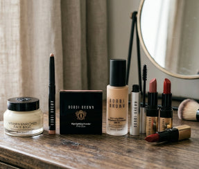 Bobbi Brown makeup collection with foundation, Vitamin Enriched Face Base, and lipsticks on ZARÉ Cosmetics