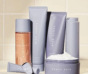 Fenty Skin skincare collection including cleanser, toner, and moisturizer cream tub on ZARÉ Cosmetics
