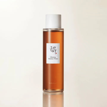Close-up skincare product shot of Ginseng Essence Water bottle reflecting clean Korean herbal skincare aesthetic.