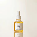 Beauty of Joseon Glow Serum Propolis + Niacinamide bottle with golden liquid dropper, highlighting pore care and skin glow benefits in a clean minimal skincare aesthetic