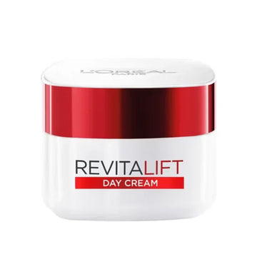 L'Oreal Paris Revitalift Day Cream anti-aging moisturizer jar with a metallic red lid isolated on ZARÉ Cosmetics