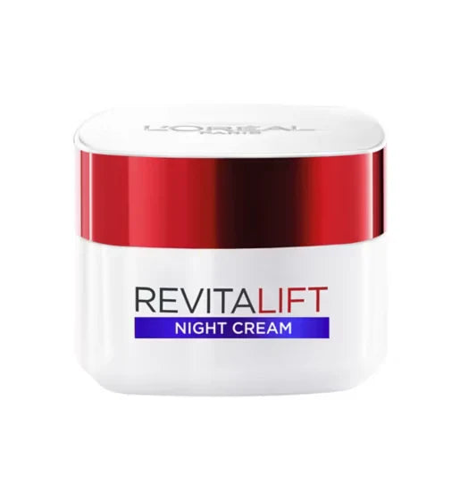 L'Oreal Paris Revitalift Night Cream anti-aging moisturizer jar with a metallic red lid isolated on ZARÉ Cosmetics