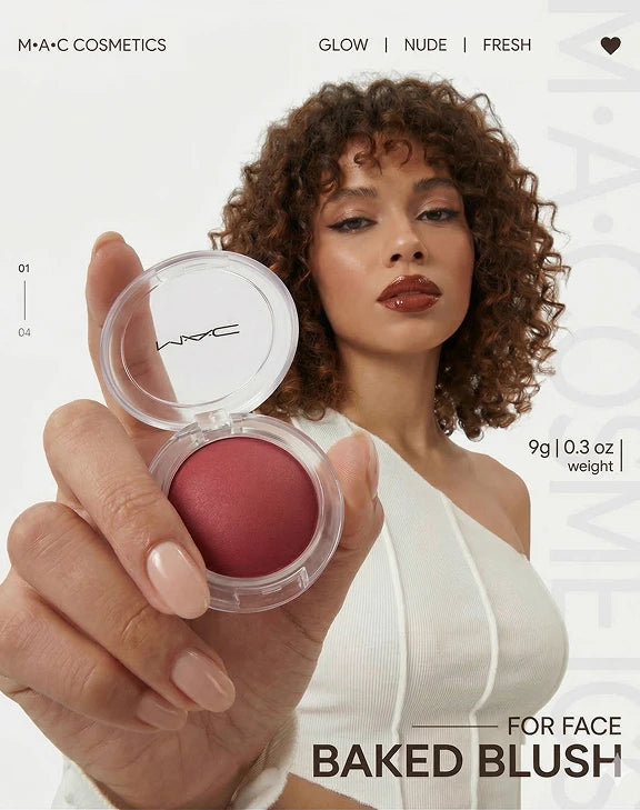 MAC Cosmetics baked blush in a pink berry shade held by a model with curly hair on ZARÉ Cosmetics