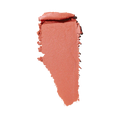 MAC Glow Play creamy blush or lip product texture swatch in a coral pink shade isolated on white at ZARÉ Cosmetics