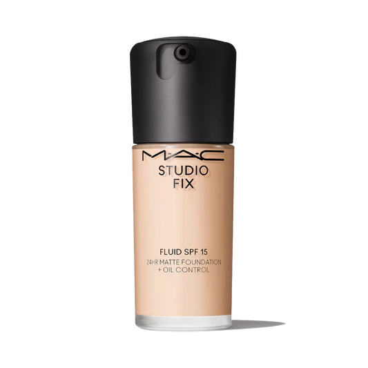 MAC Studio Fix Fluid SPF 15 24HR matte foundation bottle with pump isolated on white background at ZARÉ Cosmetics