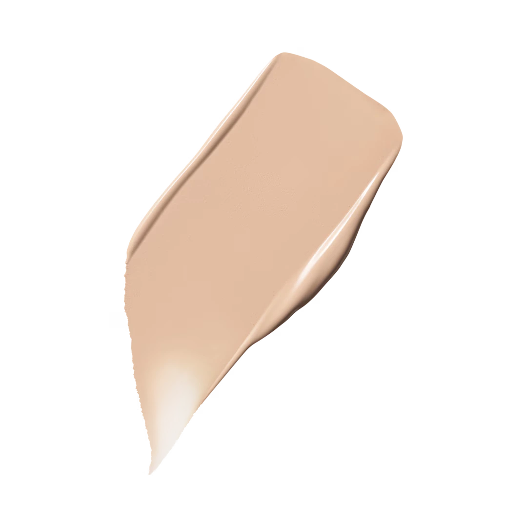 MAC Studio Fix Fluid foundation liquid texture swatch in a beige shade isolated on a white background at ZARÉ Cosmetics