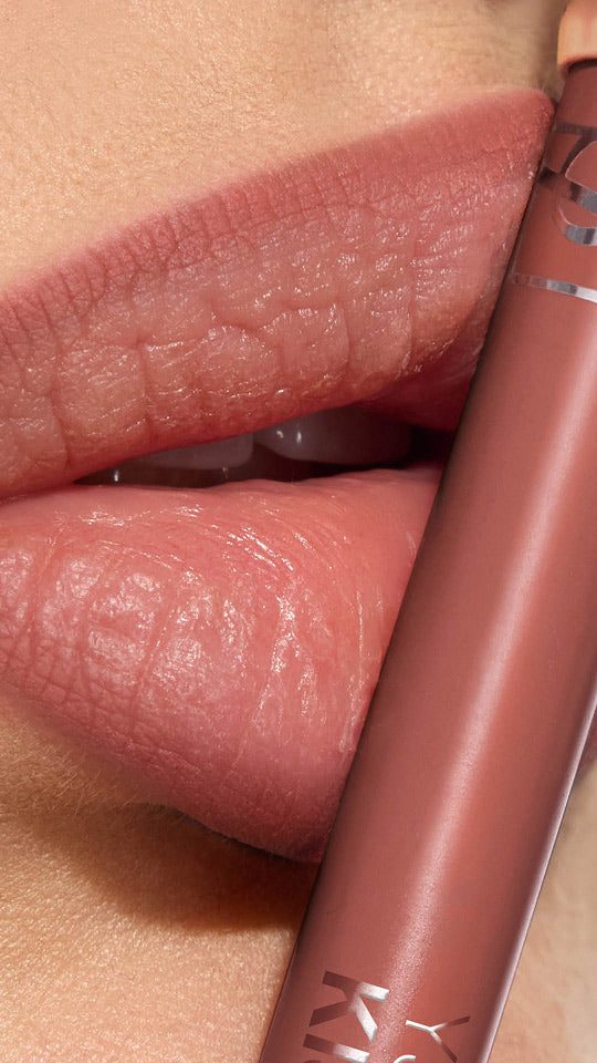 YSL Lovenude Kiss Shaper shade 103 Blushing Nude on lips close-up