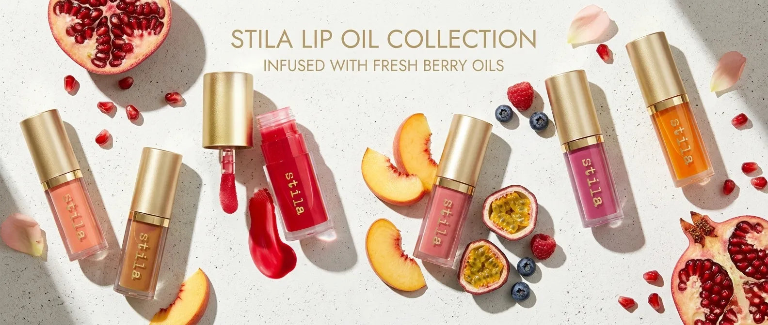 Stila Lip Oil Collection infused with berry oils banner available on ZARÉ Cosmetics.