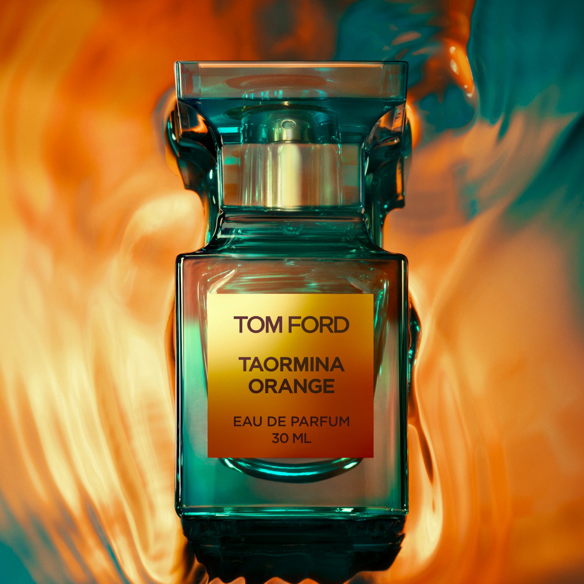 Tom Ford Taormina Orange perfume bottle with orange citrus and sea-inspired styling.