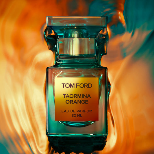 Tom Ford Taormina Orange perfume bottle with orange citrus and sea-inspired styling.